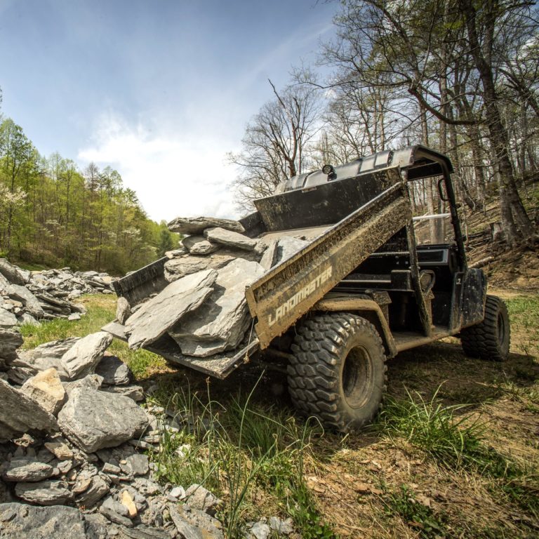 Landmaster Bed Dumping Stones